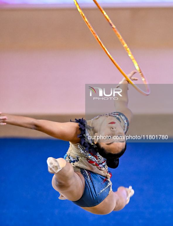 Aibota Yertaikyzy of Kazakhstan competes in the Hoop final of the International Rhythmic Gymnastics Tournament 'Sky Grace 2024' at Aspire Zo...