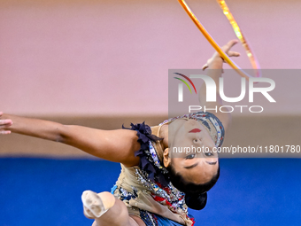 Aibota Yertaikyzy of Kazakhstan competes in the Hoop final of the International Rhythmic Gymnastics Tournament 'Sky Grace 2024' at Aspire Zo...