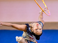 Aibota Yertaikyzy of Kazakhstan competes in the Hoop final of the International Rhythmic Gymnastics Tournament 'Sky Grace 2024' at Aspire Zo...