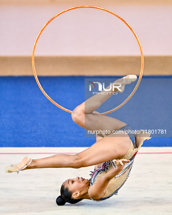 Aibota Yertaikyzy of Kazakhstan competes in the Hoop final of the International Rhythmic Gymnastics Tournament 'Sky Grace 2024' at Aspire Zo...