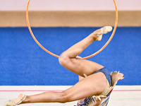 Aibota Yertaikyzy of Kazakhstan competes in the Hoop final of the International Rhythmic Gymnastics Tournament 'Sky Grace 2024' at Aspire Zo...