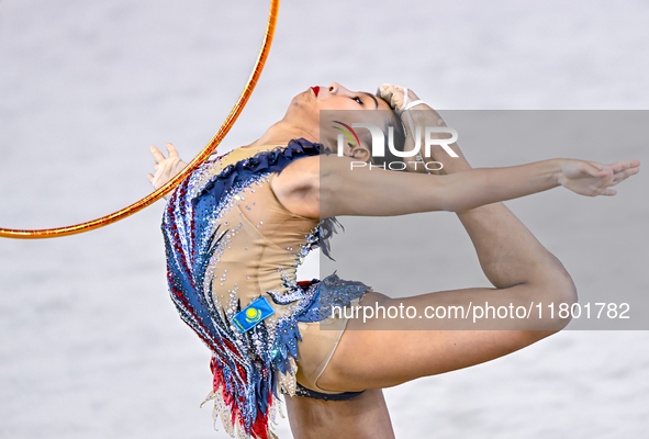 Aibota Yertaikyzy of Kazakhstan competes in the Hoop final of the International Rhythmic Gymnastics Tournament 'Sky Grace 2024' at Aspire Zo...