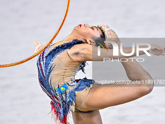 Aibota Yertaikyzy of Kazakhstan competes in the Hoop final of the International Rhythmic Gymnastics Tournament 'Sky Grace 2024' at Aspire Zo...