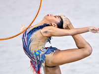 Aibota Yertaikyzy of Kazakhstan competes in the Hoop final of the International Rhythmic Gymnastics Tournament 'Sky Grace 2024' at Aspire Zo...