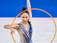 Aibota Yertaikyzy of Kazakhstan competes in the Hoop final of the International Rhythmic Gymnastics Tournament 'Sky Grace 2024' at Aspire Zo...