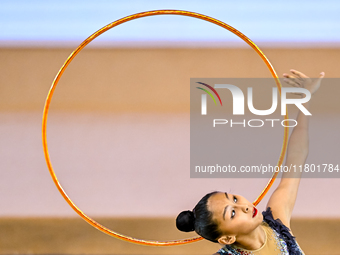 Aibota Yertaikyzy of Kazakhstan competes in the Hoop final of the International Rhythmic Gymnastics Tournament 'Sky Grace 2024' at Aspire Zo...