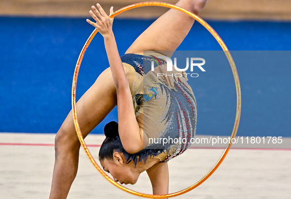 Aibota Yertaikyzy of Kazakhstan competes in the Hoop final of the International Rhythmic Gymnastics Tournament 'Sky Grace 2024' at Aspire Zo...