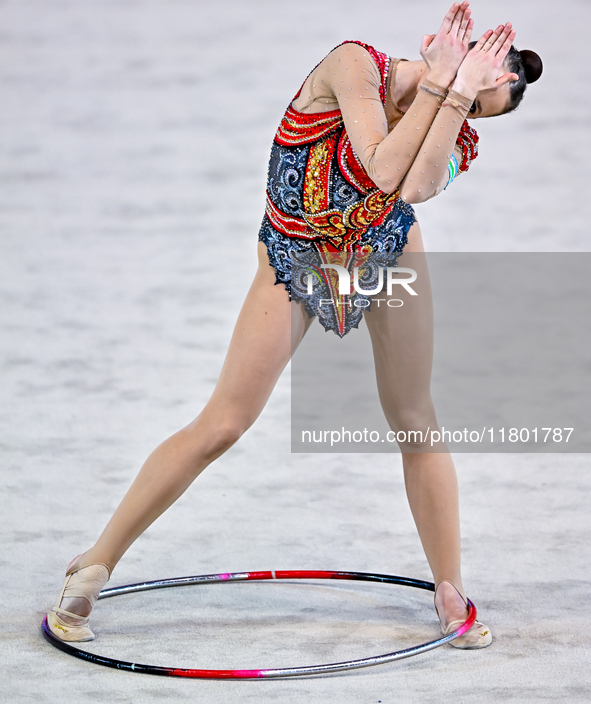 Takhmina Ikromova of Uzbekistan competes in the Hoop final of the International Rhythmic Gymnastics Tournament ''Sky Grace 2024'' at Aspire...