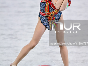 Takhmina Ikromova of Uzbekistan competes in the Hoop final of the International Rhythmic Gymnastics Tournament ''Sky Grace 2024'' at Aspire...