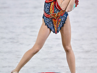 Takhmina Ikromova of Uzbekistan competes in the Hoop final of the International Rhythmic Gymnastics Tournament ''Sky Grace 2024'' at Aspire...