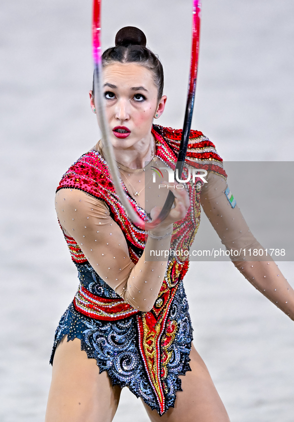 Takhmina Ikromova of Uzbekistan competes in the Hoop final of the International Rhythmic Gymnastics Tournament ''Sky Grace 2024'' at Aspire...