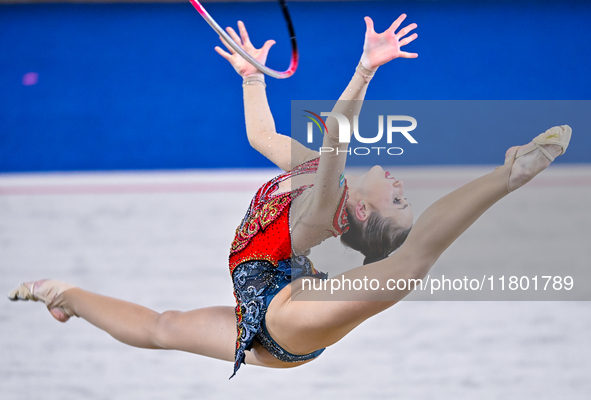 Takhmina Ikromova of Uzbekistan competes in the Hoop final of the International Rhythmic Gymnastics Tournament ''Sky Grace 2024'' at Aspire...