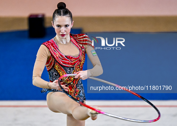 Takhmina Ikromova of Uzbekistan competes in the Hoop final of the International Rhythmic Gymnastics Tournament ''Sky Grace 2024'' at Aspire...