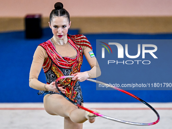 Takhmina Ikromova of Uzbekistan competes in the Hoop final of the International Rhythmic Gymnastics Tournament ''Sky Grace 2024'' at Aspire...