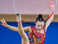 Takhmina Ikromova of Uzbekistan competes in the Hoop final of the International Rhythmic Gymnastics Tournament ''Sky Grace 2024'' at Aspire...