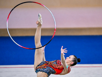 Takhmina Ikromova of Uzbekistan competes in the Hoop final of the International Rhythmic Gymnastics Tournament ''Sky Grace 2024'' at Aspire...