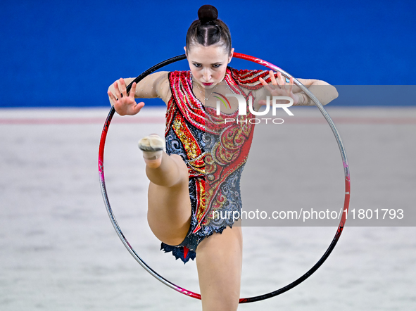 Takhmina Ikromova of Uzbekistan competes in the Hoop final of the International Rhythmic Gymnastics Tournament ''Sky Grace 2024'' at Aspire...