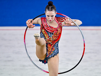 Takhmina Ikromova of Uzbekistan competes in the Hoop final of the International Rhythmic Gymnastics Tournament ''Sky Grace 2024'' at Aspire...