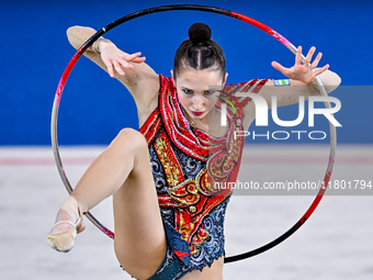 Takhmina Ikromova of Uzbekistan competes in the Hoop final of the International Rhythmic Gymnastics Tournament ''Sky Grace 2024'' at Aspire...