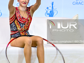 Takhmina Ikromova of Uzbekistan competes in the Hoop final of the International Rhythmic Gymnastics Tournament ''Sky Grace 2024'' at Aspire...