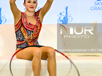 Takhmina Ikromova of Uzbekistan competes in the Hoop final of the International Rhythmic Gymnastics Tournament ''Sky Grace 2024'' at Aspire...