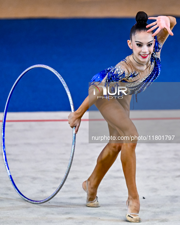 Polina Frolova of Russia competes in the Hoop final of the International Rhythmic Gymnastics Tournament ''Sky Grace 2024'' at Aspire Zone Fo...