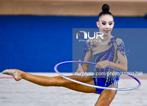 Polina Frolova of Russia competes in the Hoop final of the International Rhythmic Gymnastics Tournament ''Sky Grace 2024'' at Aspire Zone Fo...