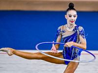 Polina Frolova of Russia competes in the Hoop final of the International Rhythmic Gymnastics Tournament ''Sky Grace 2024'' at Aspire Zone Fo...