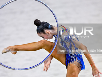 Polina Frolova of Russia competes in the Hoop final of the International Rhythmic Gymnastics Tournament ''Sky Grace 2024'' at Aspire Zone Fo...