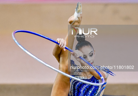 Polina Frolova of Russia competes in the Hoop final of the International Rhythmic Gymnastics Tournament ''Sky Grace 2024'' at Aspire Zone Fo...