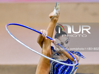 Polina Frolova of Russia competes in the Hoop final of the International Rhythmic Gymnastics Tournament ''Sky Grace 2024'' at Aspire Zone Fo...