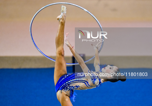 Polina Frolova of Russia competes in the Hoop final of the International Rhythmic Gymnastics Tournament ''Sky Grace 2024'' at Aspire Zone Fo...