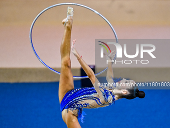 Polina Frolova of Russia competes in the Hoop final of the International Rhythmic Gymnastics Tournament ''Sky Grace 2024'' at Aspire Zone Fo...