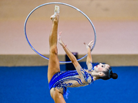 Polina Frolova of Russia competes in the Hoop final of the International Rhythmic Gymnastics Tournament ''Sky Grace 2024'' at Aspire Zone Fo...