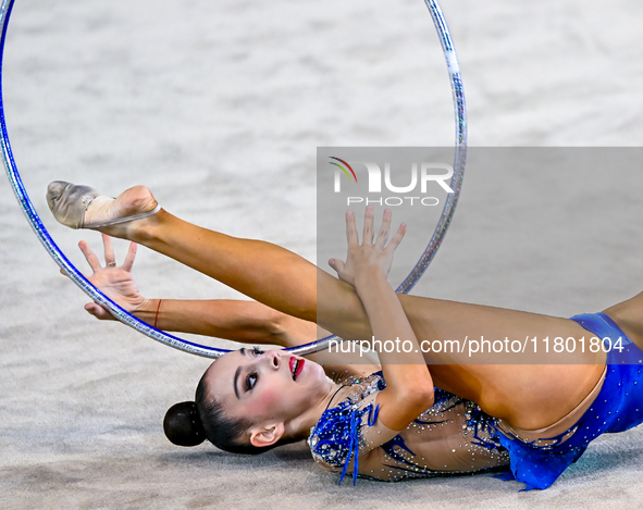 Polina Frolova of Russia competes in the Hoop final of the International Rhythmic Gymnastics Tournament ''Sky Grace 2024'' at Aspire Zone Fo...