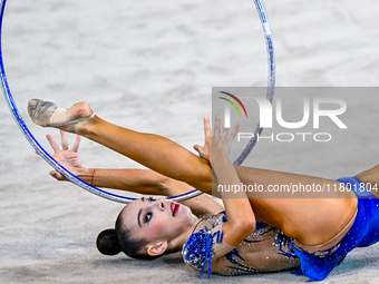 Polina Frolova of Russia competes in the Hoop final of the International Rhythmic Gymnastics Tournament ''Sky Grace 2024'' at Aspire Zone Fo...