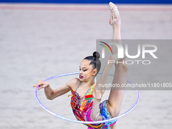 Anna Kondrashina of Belarus competes in the Hoop final of the International Rhythmic Gymnastics Tournament 'Sky Grace 2024' at Aspire Zone F...