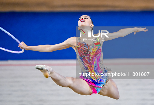 Anna Kondrashina of Belarus competes in the Hoop final of the International Rhythmic Gymnastics Tournament 'Sky Grace 2024' at Aspire Zone F...