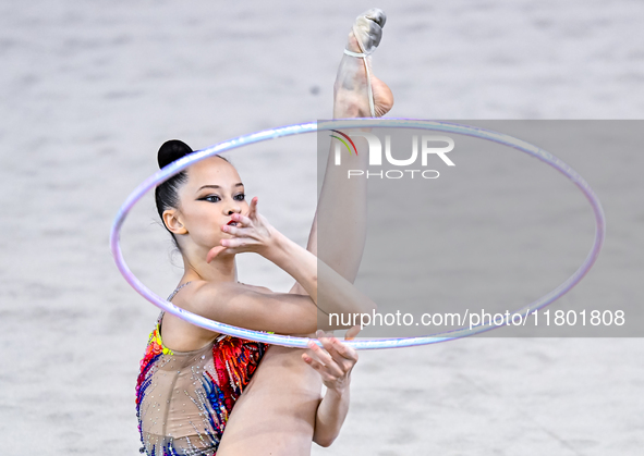 Anna Kondrashina of Belarus competes in the Hoop final of the International Rhythmic Gymnastics Tournament 'Sky Grace 2024' at Aspire Zone F...