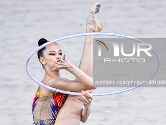 Anna Kondrashina of Belarus competes in the Hoop final of the International Rhythmic Gymnastics Tournament 'Sky Grace 2024' at Aspire Zone F...