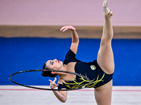 Zohra Aghamirova of Azerbaijan competes in the Hoop final of the International Rhythmic Gymnastics Tournament ''Sky Grace 2024'' at Aspire Z...