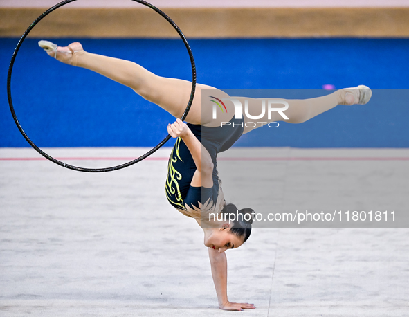 Zohra Aghamirova of Azerbaijan competes in the Hoop final of the International Rhythmic Gymnastics Tournament ''Sky Grace 2024'' at Aspire Z...