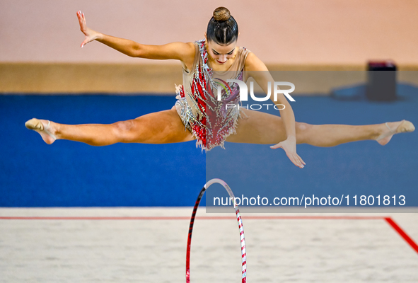 Andjela Mazibrada of Serbia competes in the Hoop final of the International Rhythmic Gymnastics Tournament ''Sky Grace 2024'' at Aspire Zone...