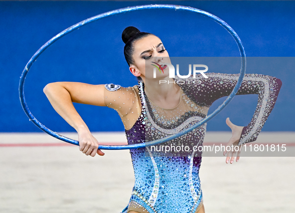 Alina Harnasko of Belarus competes in the Hoop final of the International Rhythmic Gymnastics Tournament 'Sky Grace 2024' at Aspire Zone Fou...