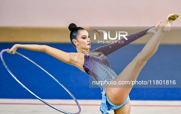 Alina Harnasko of Belarus competes in the Hoop final of the International Rhythmic Gymnastics Tournament 'Sky Grace 2024' at Aspire Zone Fou...