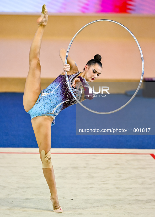 Alina Harnasko of Belarus competes in the Hoop final of the International Rhythmic Gymnastics Tournament 'Sky Grace 2024' at Aspire Zone Fou...