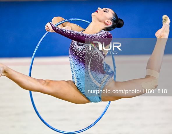 Alina Harnasko of Belarus competes in the Hoop final of the International Rhythmic Gymnastics Tournament 'Sky Grace 2024' at Aspire Zone Fou...