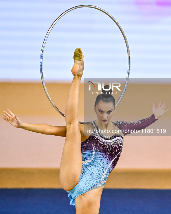 Alina Harnasko of Belarus competes in the Hoop final of the International Rhythmic Gymnastics Tournament 'Sky Grace 2024' at Aspire Zone Fou...