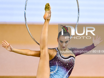 Alina Harnasko of Belarus competes in the Hoop final of the International Rhythmic Gymnastics Tournament 'Sky Grace 2024' at Aspire Zone Fou...