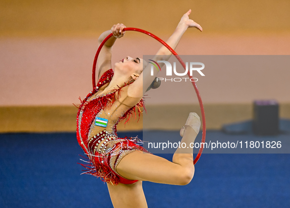 Natalya Usova of Uzbekistan competes in the Hoop final of the International Rhythmic Gymnastics Tournament ''Sky Grace 2024'' at Aspire Zone...